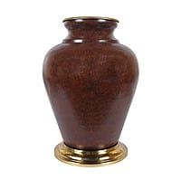 Textured Metal Vase adorned with a leaf Textured Metal Vase adorned with a leaf