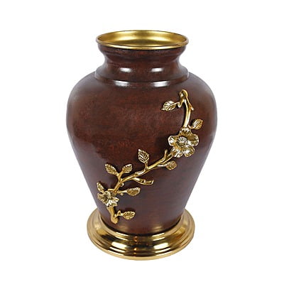 Textured Metal Vase adorned with a leaf