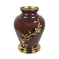 Textured Metal Vase adorned with a leaf Textured Metal Vase adorned with a leaf